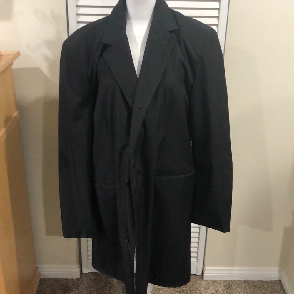 New without tags men’s rain jacket